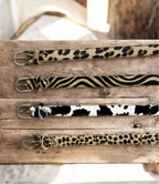 CINTURÓN PIEL Y PELO ANIMAL PRINT