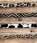CINTURÓN PIEL Y PELO ANIMAL PRINT
